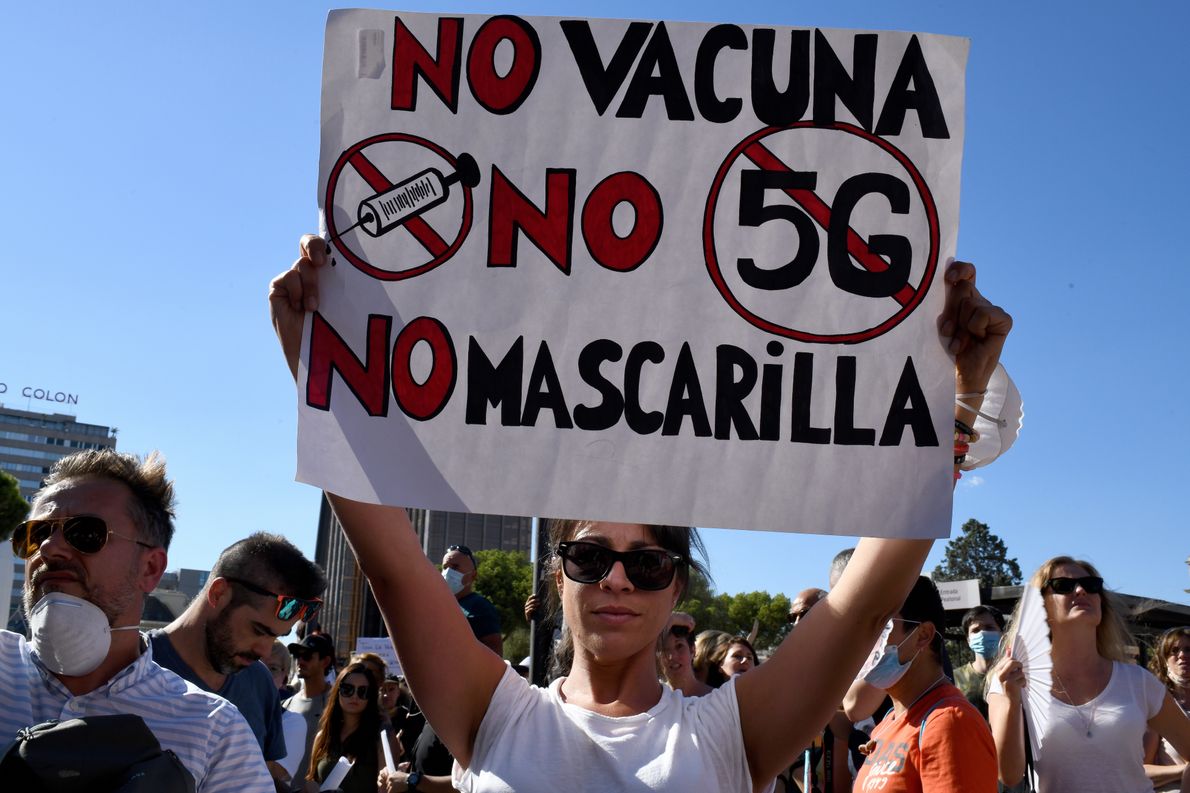 Hundreds of people deny the existence of the coronavirus and point to conspiracy theories about controlling the population with vaccines in Madrid, Spain on 16th August, 2020. (Photo by Juan Carlos Lucas/NurPhoto via Getty Images)