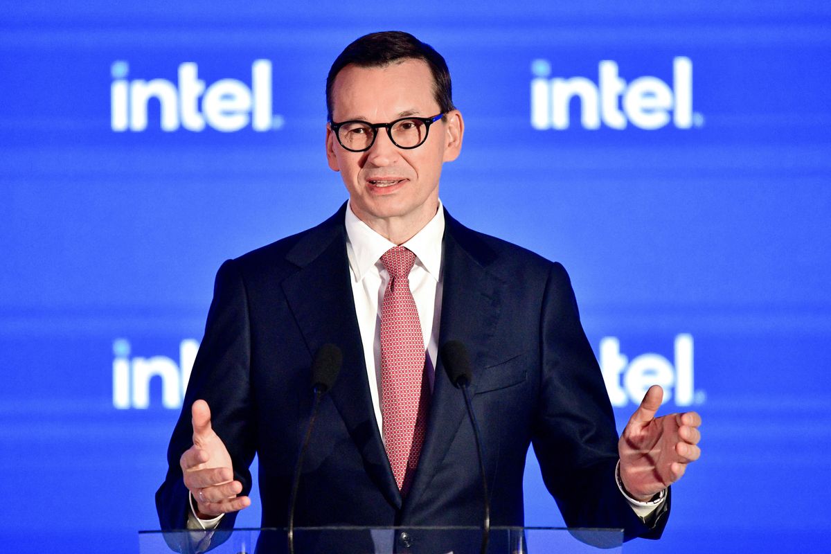 prompthunt: screenshot of a smiling muscular matusz morawiecki