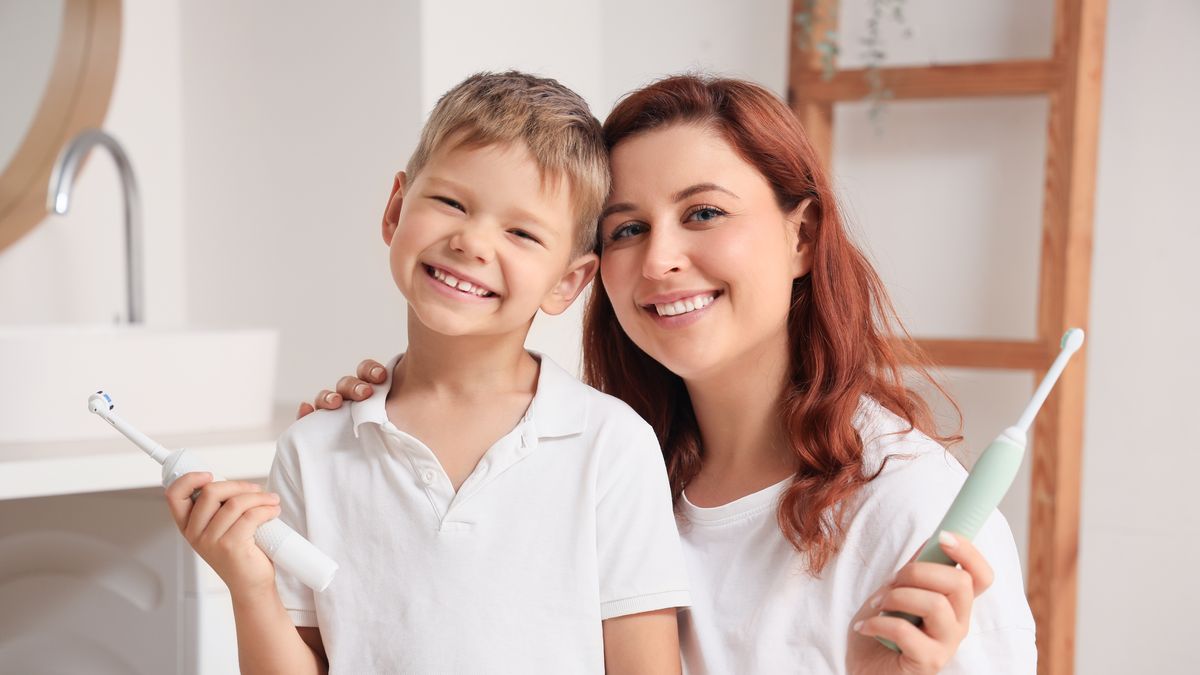 Happy,Mother,And,Her,Little,Son,With,Electric,Toothbrushes,In
parent,caucasian,happy,brushing,smile,mother,son,children,dental,hygiene,wellbeing,teeth,female,bathroom,brush,smiling,cavity,person,adult,care,child,little,treatment,woman,dentistry,young,kid,boy,breath,wellness,indoors,tooth,cleaning,electric,enamel,health,clean,portrait,people,toothbrushes,everyday,home,lifestyle,mouth,healthy,oral,dents,family,caries,stomatology
