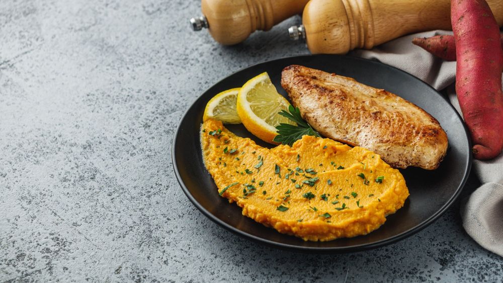 Delicious,Mashed,Sweet,Potatoes,And,Fried,Chicken,Breast,On,A
chicken,batatas,yellow,puree,vegetable,agriculture,red,rustic,slice,potato,root,vegetarian,ingredients,mash,wood,diet,organic,ingredient,yam,asia,health,chiken,vegan,brown,food,fried,meal,orange,wooden,tuber,baked,roasted,edible,ipomoea,tasty,fresh,sweet,breast,crop