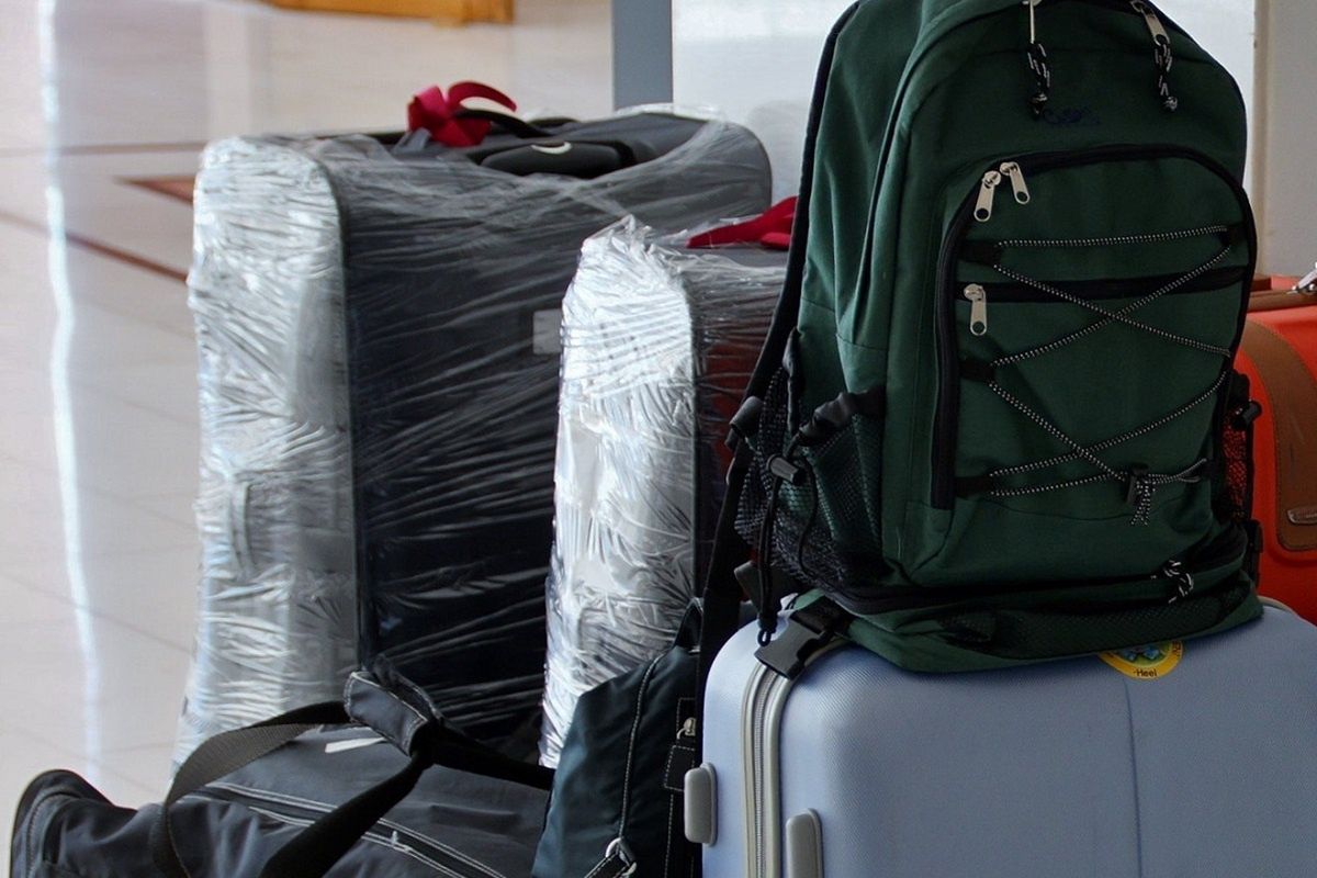 Cling Wrap The Travel Hack Protecting Suitcases Worldwide