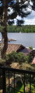 Domki i pokoje nad jeziorem u Renaty