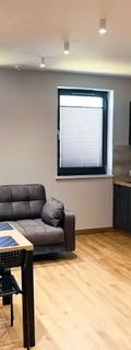 Pod Czwórką Pokoje i Apartamenty
