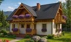 Projekt domu L-30 Dom ludowa - murowany - parterowy z poddaszem dom o powierzchni 90,70 m², dach dwuspadowy, koszt budowy 234 000 zł - ujęcie frontu