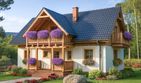 Projekt domu L-30 Dom ludowa - szkieletowy - parterowy z poddaszem dom o powierzchni 96,40 m², dach dwuspadowy, koszt budowy 231 360 zł - ujęcie frontu