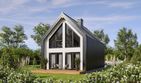 Projekt domu L-302 N murowany - parterowy z poddaszem dom o powierzchni 69,93 m², dach dwuspadowy, koszt budowy 218 000 zł - ujęcie frontu