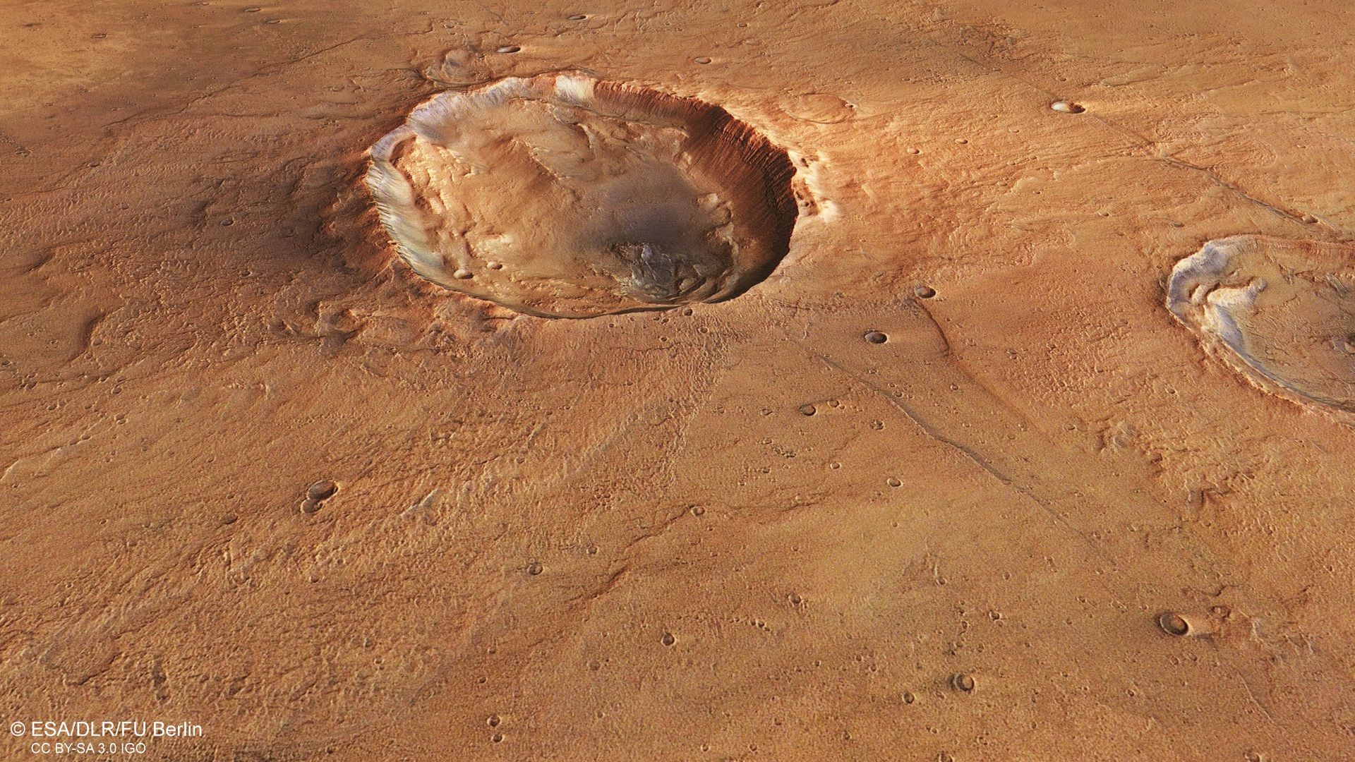 Fascynujący krater na Marsie. Jego zbocza wskazują na działanie wody