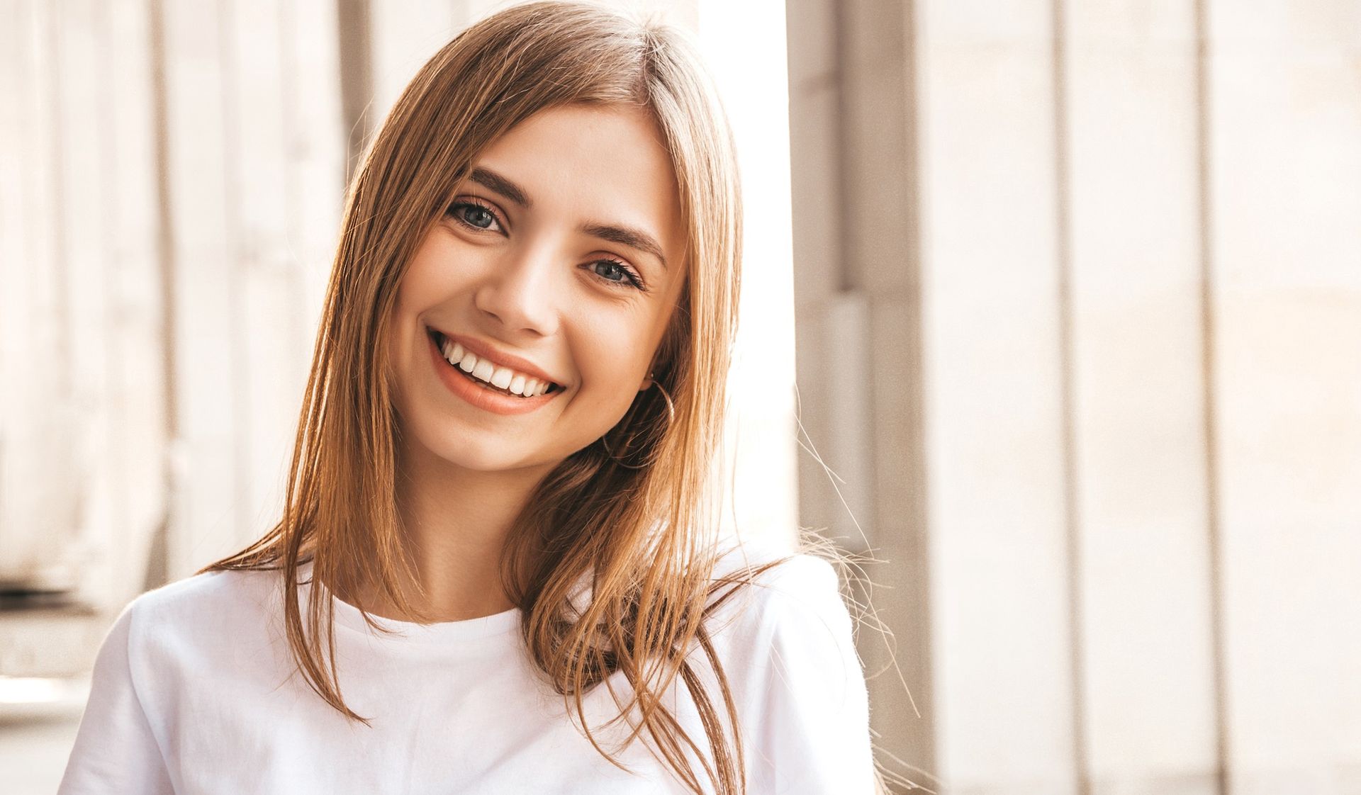 Portrait of beautiful smiling blond girl