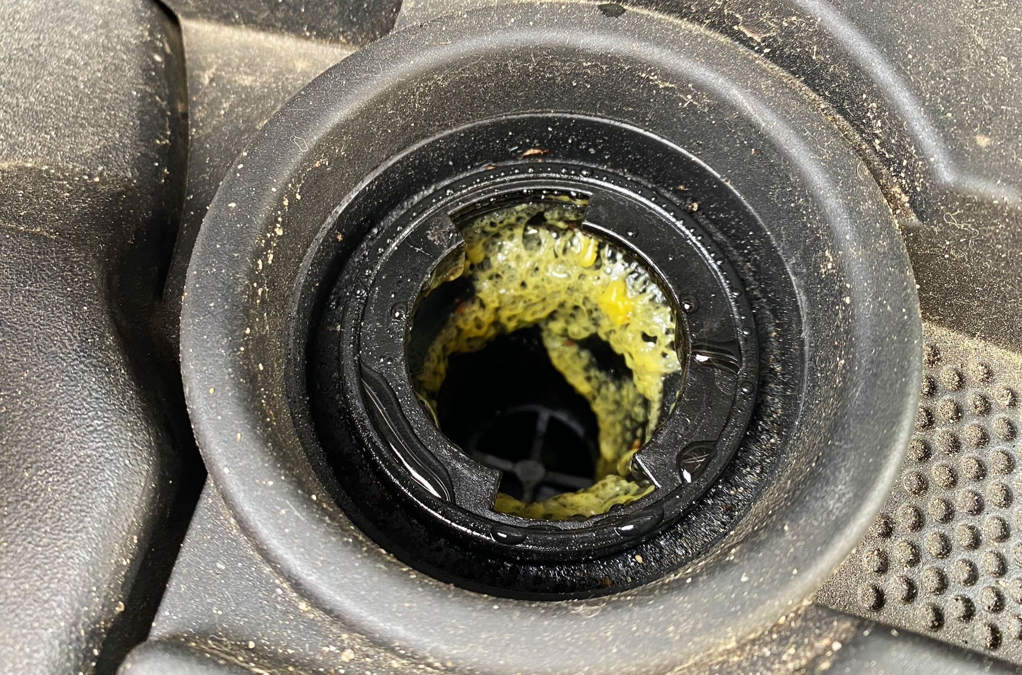 car care solving the mystery of yellow sludge under oil cap