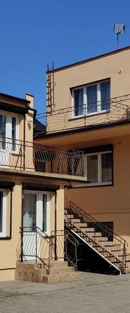 Pokoje Gościnne i Apartament "Przy lesie"