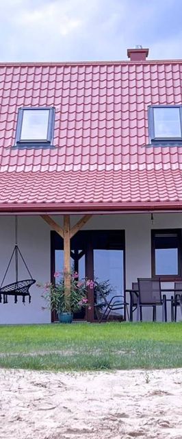 Domki nad jeziorem z banią i jacuzzi