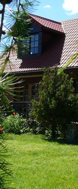 Domek nad rzeką Krutynią