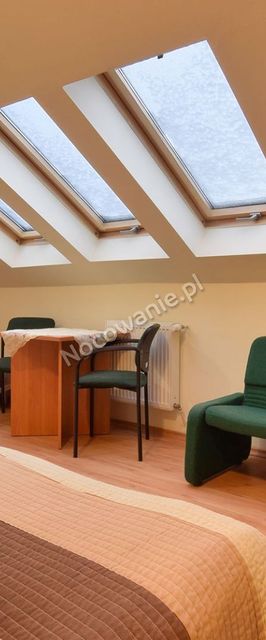 Apartamenty i Pokoje Gościnne Centrum