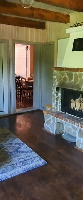 Casa Dintre Brazi Comandău