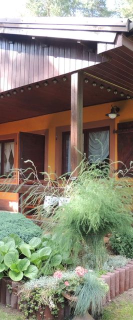 Dom nad jeziorem i w otoczeniu lasów Biskupiec