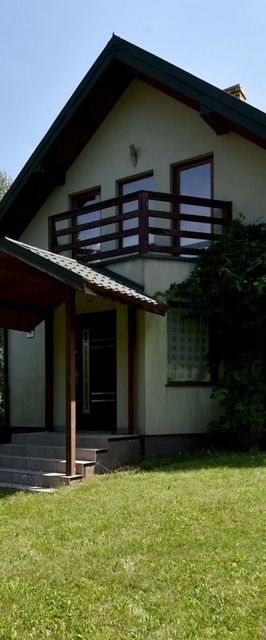 Dom wśród modrzewi Uście Gorlickie