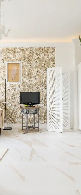 Pl. Inwalidów 10/70^