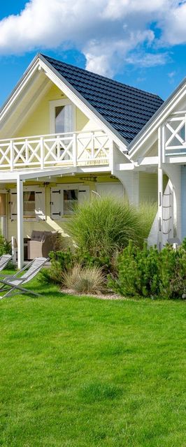 Domki nad morzem Otulone Słońcem Rowy