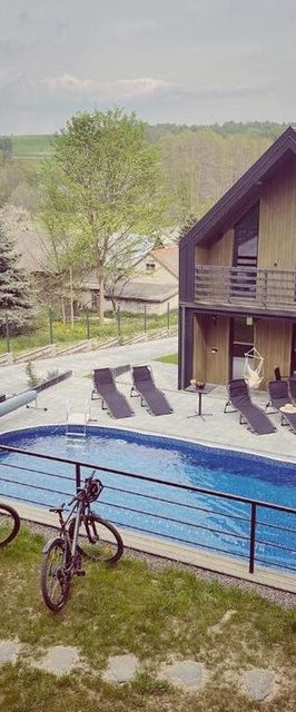 Wzgórza Kunowskie - domy na wynajem z basenem, baliami i saunami Bodzentyn