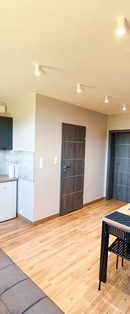 Pod Czwórką Pokoje i Apartamenty