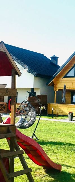 Delfinek - Domki - Apartamenty 