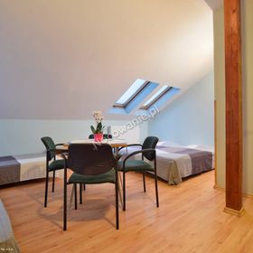 Apartamenty i Pokoje Gościnne Centrum