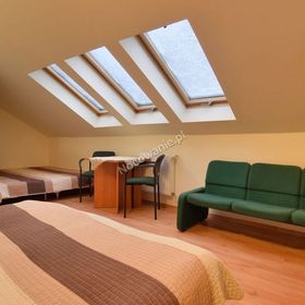 Apartamenty i Pokoje Gościnne Centrum