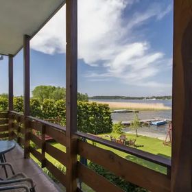 Apartamenty i Pokoje nad brzegiem jeziora Tałty