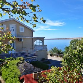 Apartment Jela-on the seafront Tribanj