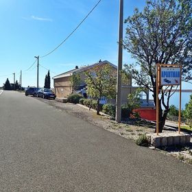 Apartment Jela-on the seafront Tribanj