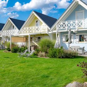 Domki nad morzem Otulone Słońcem Rowy