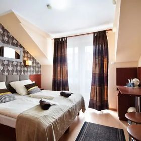 Pokoje i Domki Omega