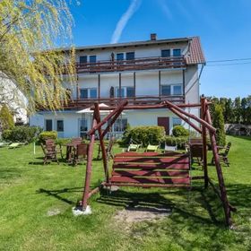 Apartamenty i Pokoje nad brzegiem jeziora Tałty