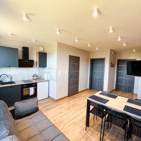 Pod Czwórką Pokoje i Apartamenty