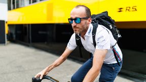 F1: Grand Prix Bahrajnu. Rozgrzewka przed treningami. Robert Kubica na rowerze (foto)