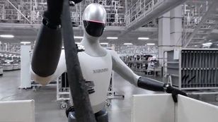 Xiaomi's humanoid robot works on complex tasks at a car factory
