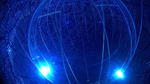 Antineutrinos from nuclear reactor detected 240 km away using ultra-pure water tank