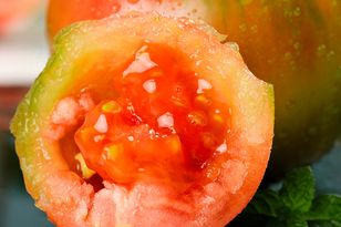 Green patch on a tomato — cut it off or throw the whole fruit away?
