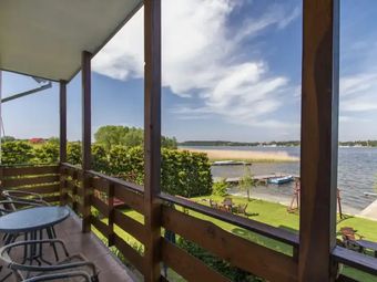 Apartamenty i Pokoje nad brzegiem jeziora Tałty