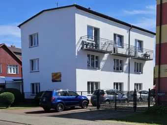 Pokoje Gościnne i Apartamenty