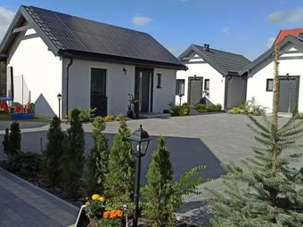 Domki pod katalpami Mikołajki