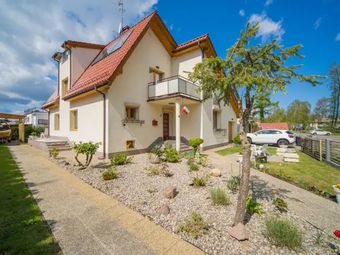 Pod Lasem - domki i pokoje gościnne