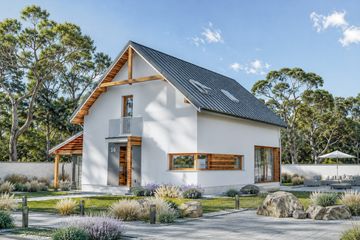 Projekt domu eko Typowy 7 - parterowy z poddaszem dom o powierzchni 141,30 m², dach dwuspadowy, koszt budowy 377 000 zł - ujęcie frontu