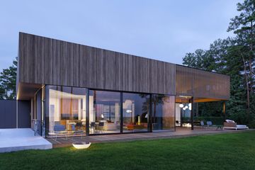 Projekt domu D21-18A G2 - parterowy dom o powierzchni 185,35 m², dach płaski, koszt budowy 662 000 zł - ujęcie frontu