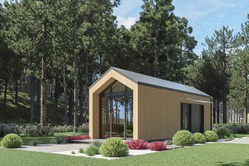 Projekt domu letniskowego DM7 - wersja drewniana - parterowy dom o powierzchni 22,87 m², dach dwuspadowy - ujęcie frontu