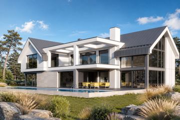 Projekt domu LK&1568 - parterowy z poddaszem dom o powierzchni 338,99 m², dach dwuspadowy, koszt budowy 1 082 000 zł - ujęcie frontu