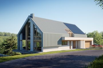 Projekt domu LK&1516 - parterowy z poddaszem dom o powierzchni 207,98 m², dach dwuspadowy, koszt budowy 633 000 zł - ujęcie frontu