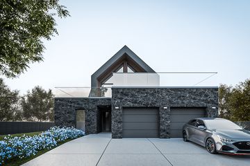 Projekt domu House x29 - parterowy z poddaszem dom o powierzchni 248,57 m², dach wielospadowy, koszt budowy 768 000 zł - ujęcie frontu