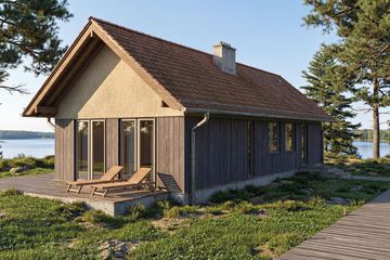 Projekt domu Kameralny 2XL - parterowy dom o powierzchni 91,56 m², dach dwuspadowy - ujęcie frontu