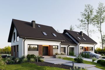 Projekt domu Czaruś Sto Duolit (1984) - parterowy z poddaszem dom o powierzchni 198,60 m², dach dwuspadowy - ujęcie frontu